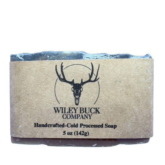 Handcrafted cold processed soap bar from Wiley Buck Company on a white background