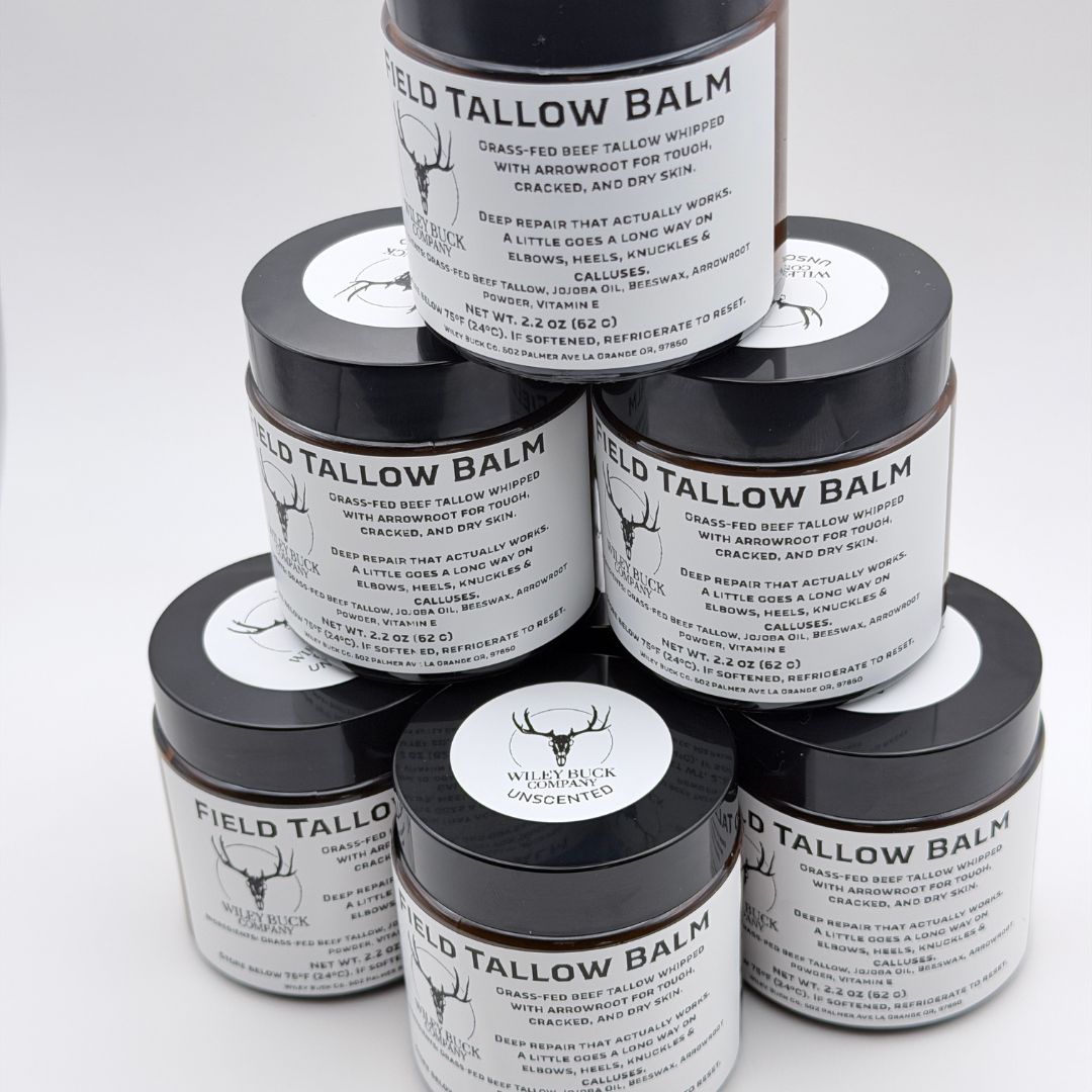 Stack of Field Tallow Balm jars on a white background