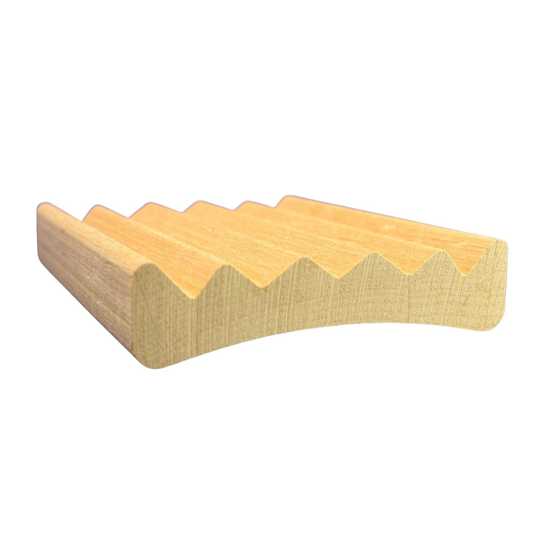 Wooden soap dish with wavy edge on a white background