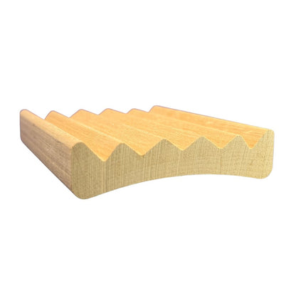 Wooden soap dish with wavy edge on a white background