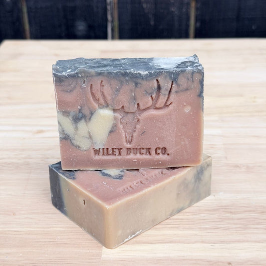 2 Bars of Wiley Buck Soap on wooden base