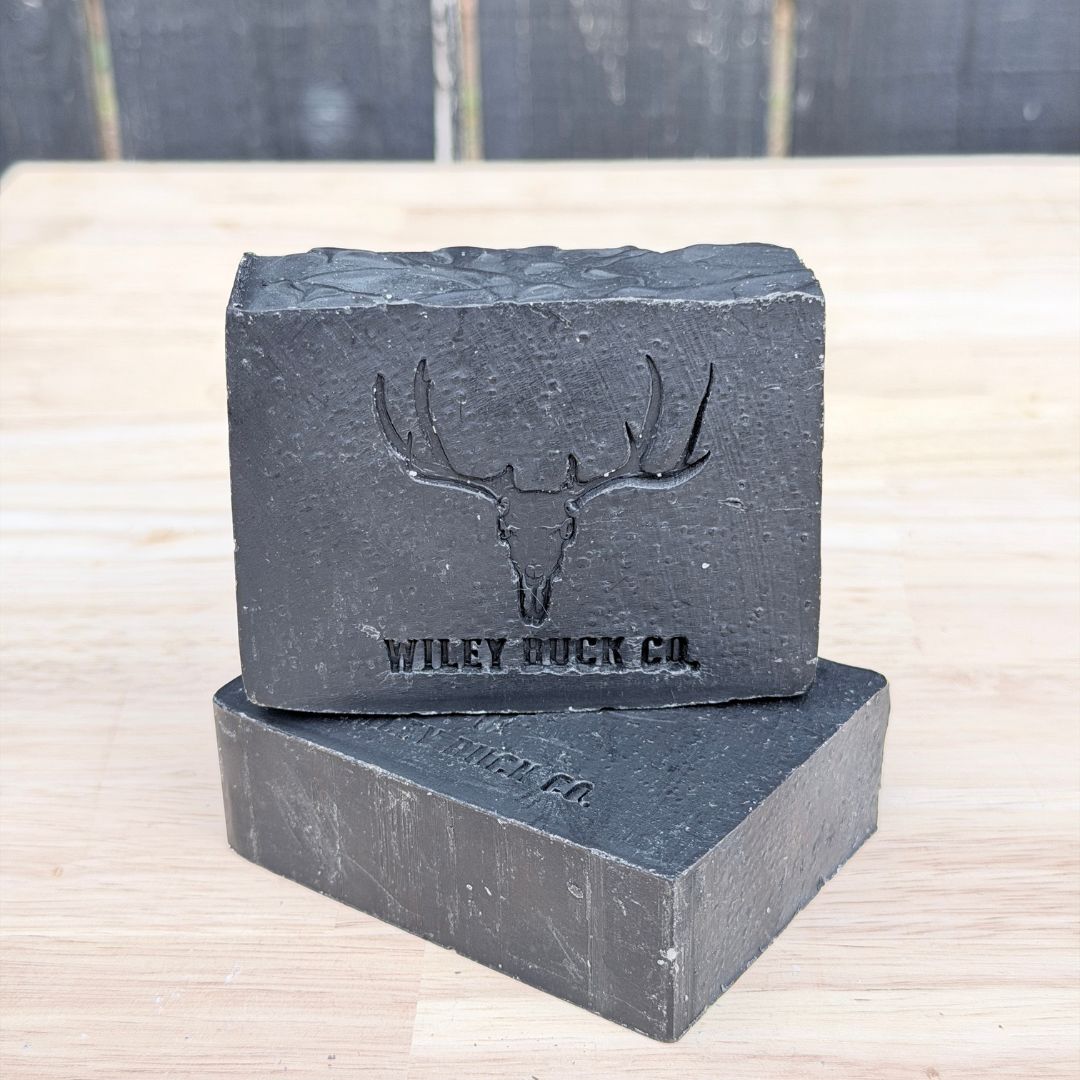 Two Wiley Buck Blackout on a wooden surface