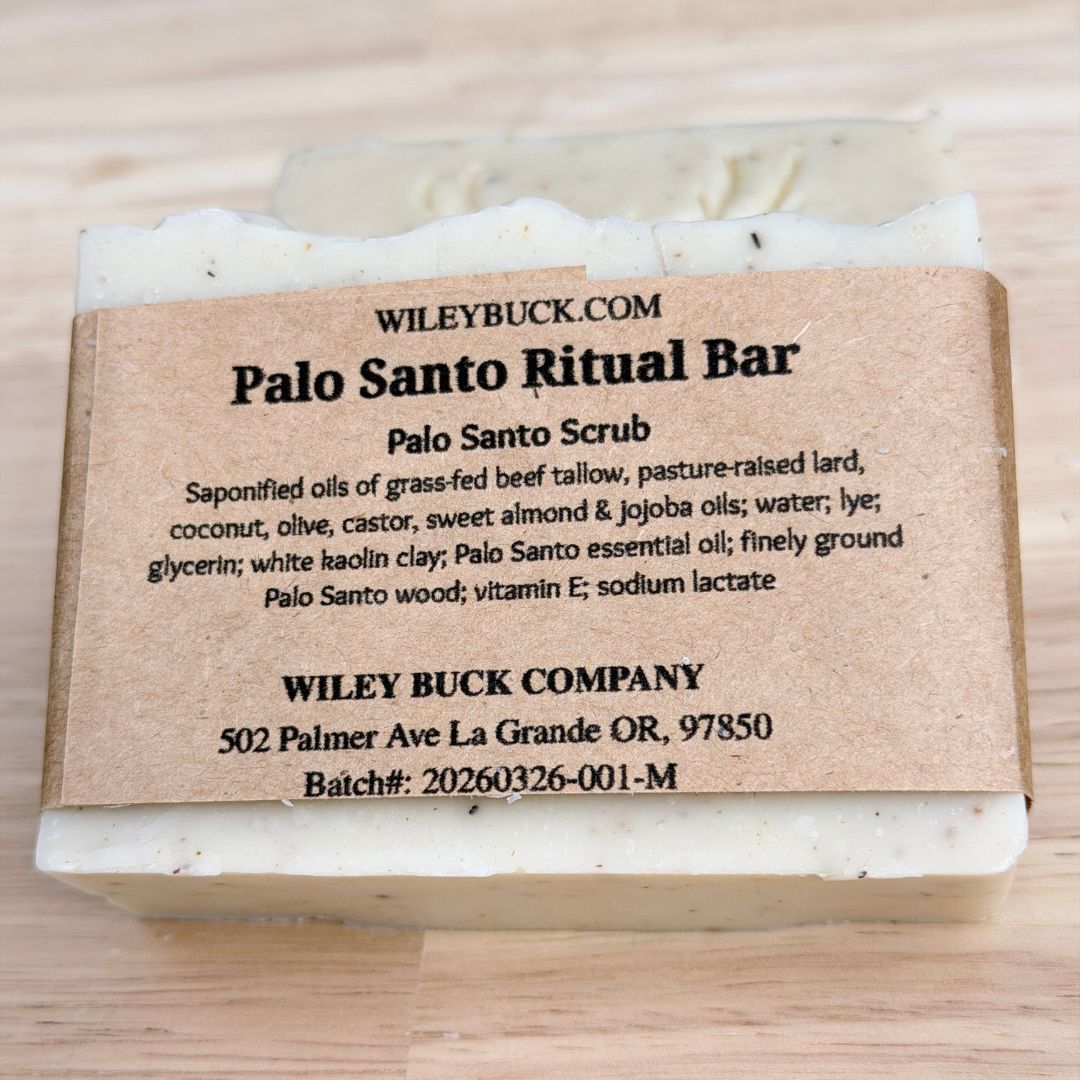 Palo Santo Ritual Bar with a label on a wooden surface